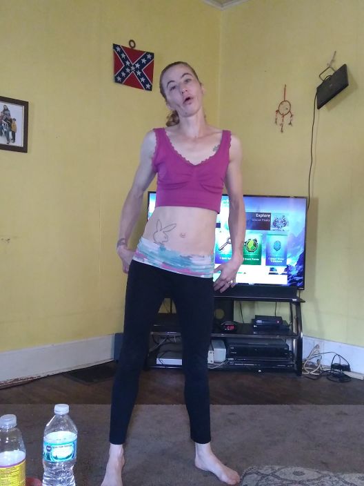 Sexy wife posing in yoga pants